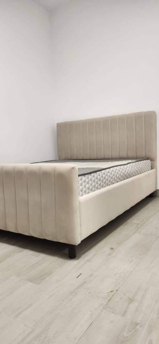 Upholstered bed with headboard